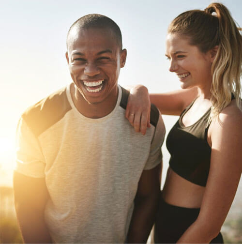 A healthy couple looking happy.